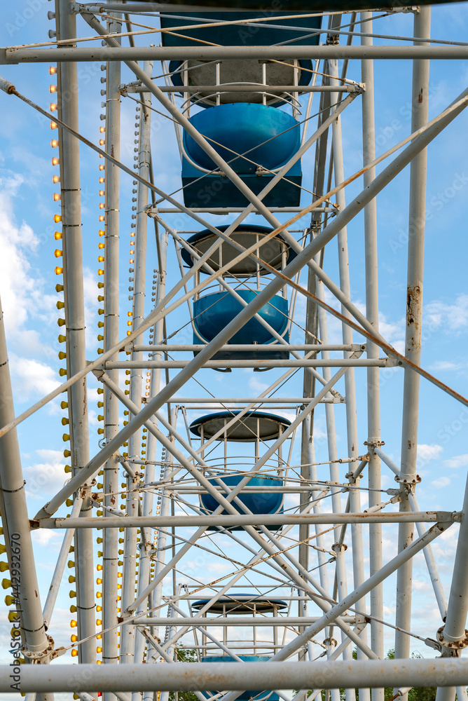 View of Inside of Ferris Wheel view of the structure with cabins. View of Inside of Ferris Wheel view of the structure with cabins.