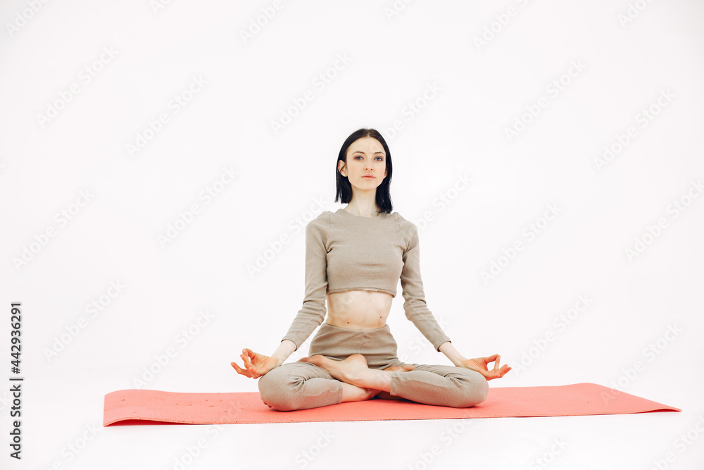 Girl with sports equipment on a white background Girl with sports equipment on a white background