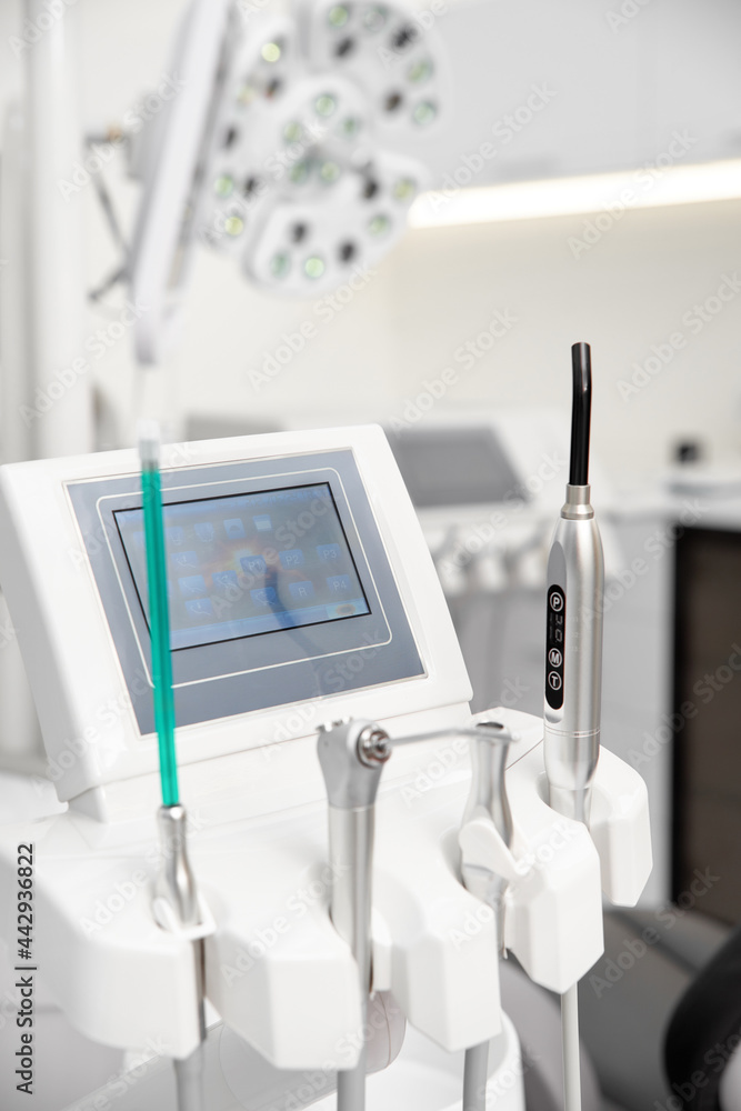Dentist's office: modern equipment and instruments. concept of stamotology Dentist's office: modern equipment and instruments. concept of stamotology