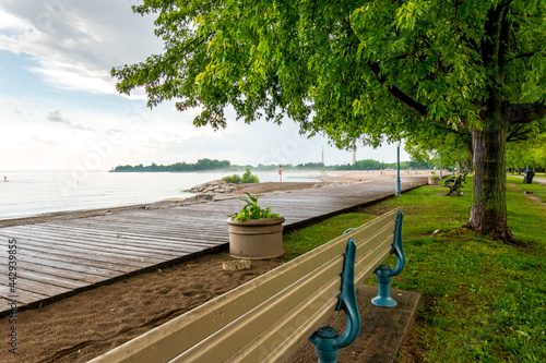 A wooden boardwalk and an empty beach after a rain storm in Toronto's Beaches neighbourhood shot in June. photo