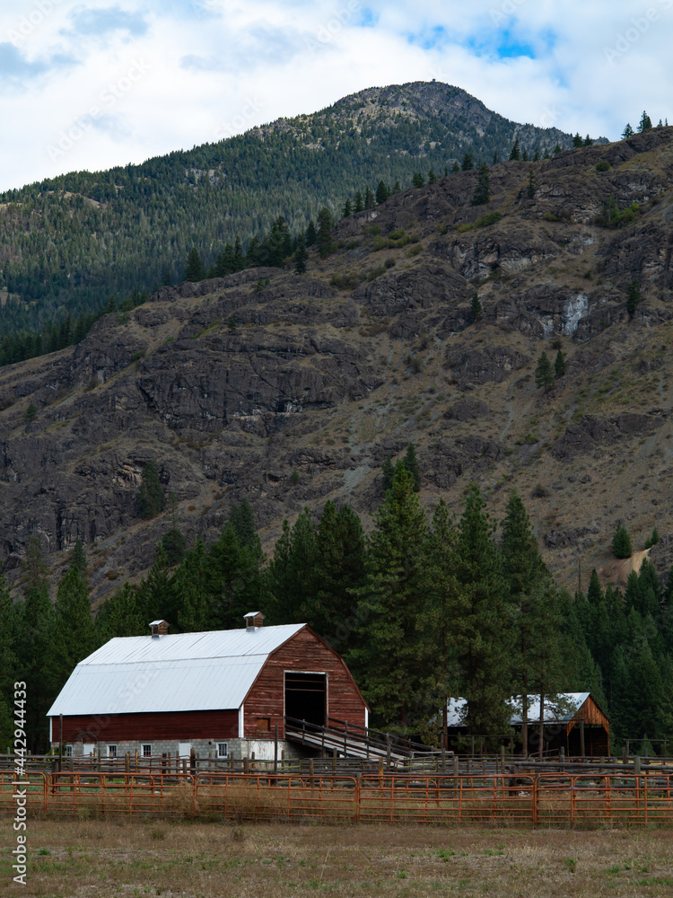Farm barn in mountain scene