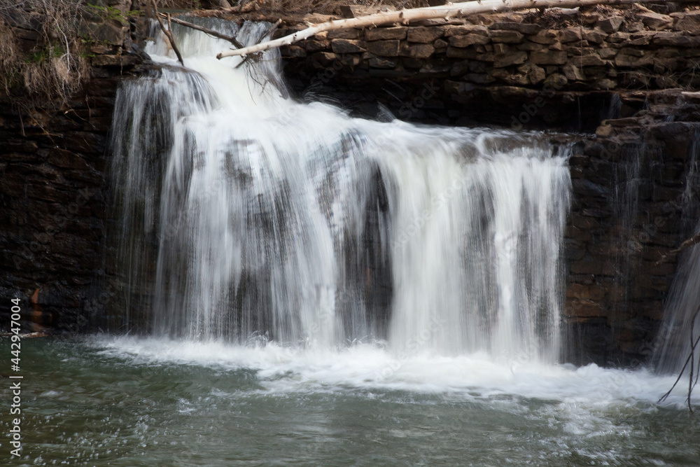 Fototapeta premium Waterfall outdoors in the sunshine