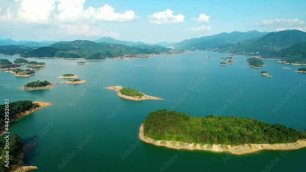 Many small islands with forest and shrubs in the bay Many small islands with forest and shrubs in the bay