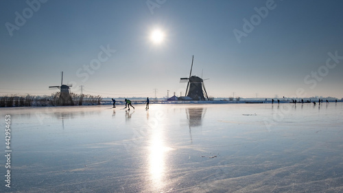 Old dutch windmill rottemeren on ice