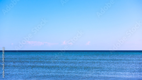 Clear sea horizon and blue sky