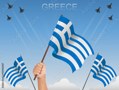 greek flags fluttering under the blue sky