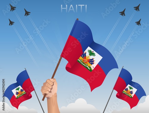 Haiti flags fluttering under the blue sky