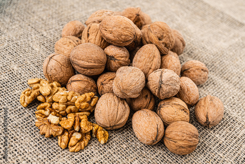 Close up view of walnuts on tabletop © EwaStudio