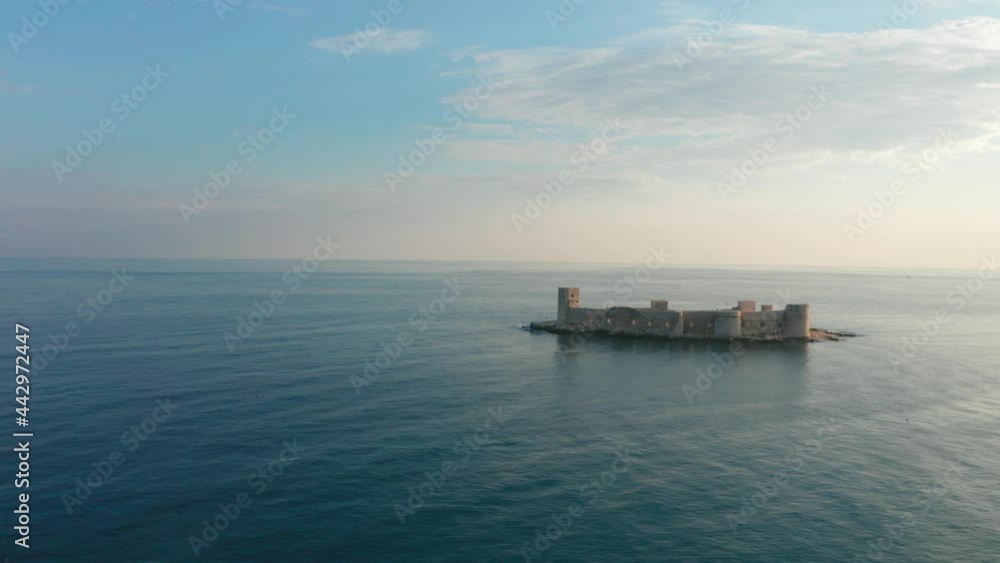 Flight over a beautiful Turkish fortress with clear azure water. Beautiful landscape with sea and top view. Flight over a beautiful Turkish fortress with clear azure water. Beautiful landscape with sea and top view.