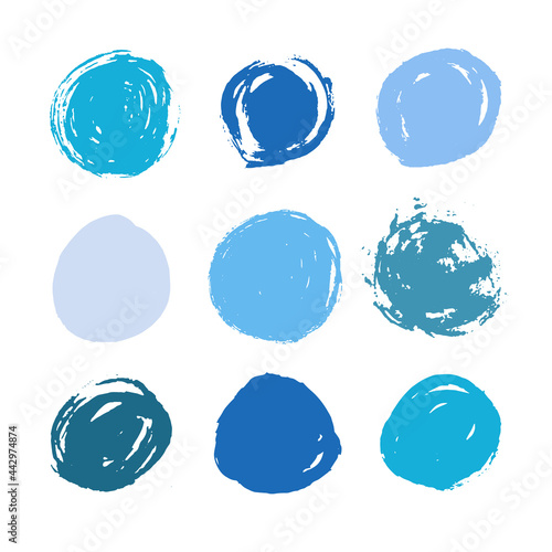 Blue vector round paint strokes isolated on white background. Circles brush