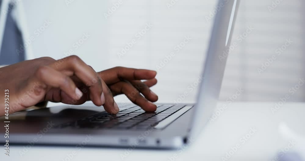 black guy typing slowly on laptop hands close up black guy typing slowly on laptop hands close up