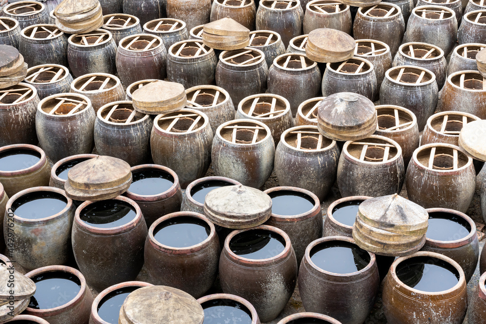 China Fujian Province Xiapu Nantang. Fish sauce is made at this factory where the fermentation takes place in this giant ceramic pots. China Fujian Province Xiapu Nantang. Fish sauce is made at this factory where the fermentation takes place in this giant ceramic pots.
