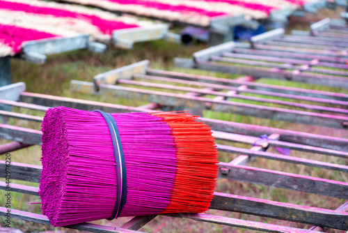 China Fujian Province Dapu Yongchun. Incense sticks are bundled after drying on racks. photo