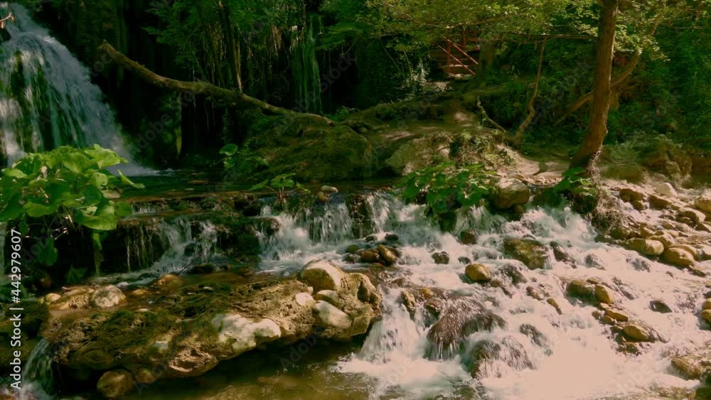 At the Volturno waterfalls the waters flow rapidly among the stones forming jumps and waterfalls. Castel San Vincenzo, Isernia, Molise At the Volturno waterfalls the waters flow rapidly among the stones forming jumps and waterfalls. Castel San Vincenzo, Isernia, Molise