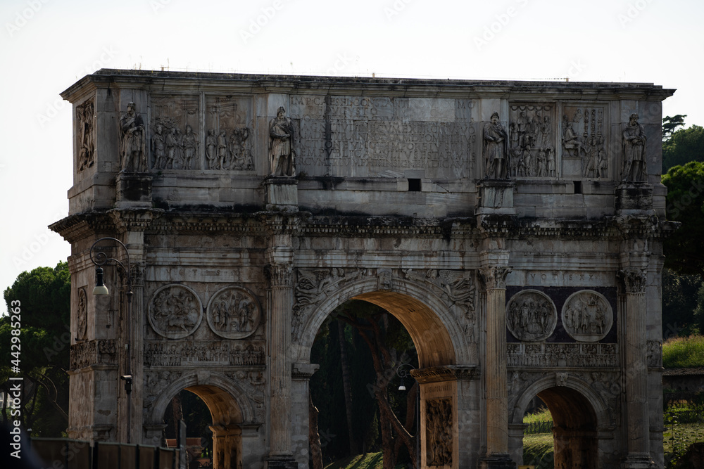 Sunny day in Rome. Colosseum. Aqueduct in Italian architecture