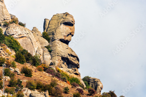 Beautiful scenic sunny blue sky landscape of Yuzhnaya Demerdzhi rocky mountain in Crimea, Russia called Dolina Privideniy, or Ghost Valley. Ekaterina's Face, or Kasper rock close up photo