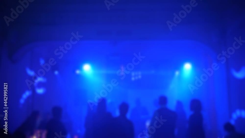 Wallpaper Mural dancing people with color lighting blurred background Torontodigital.ca