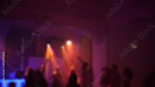 Wallpaper Mural dancing people with color lighting blurred background Torontodigital.ca