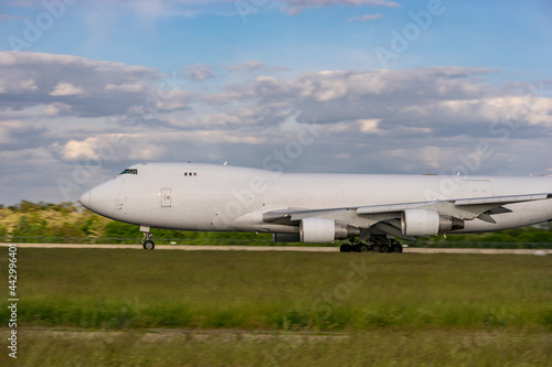 white cargo plane on the runway. without inscriptions and logos.