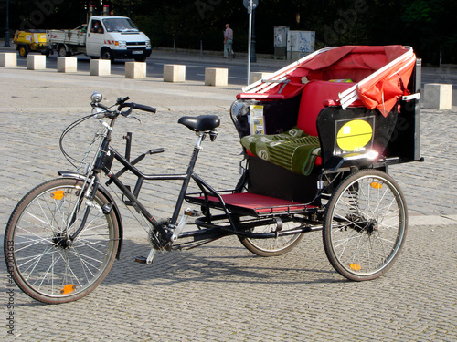 pedicab cycle rickshaw trishaw bike cab  Berlin Germany photo