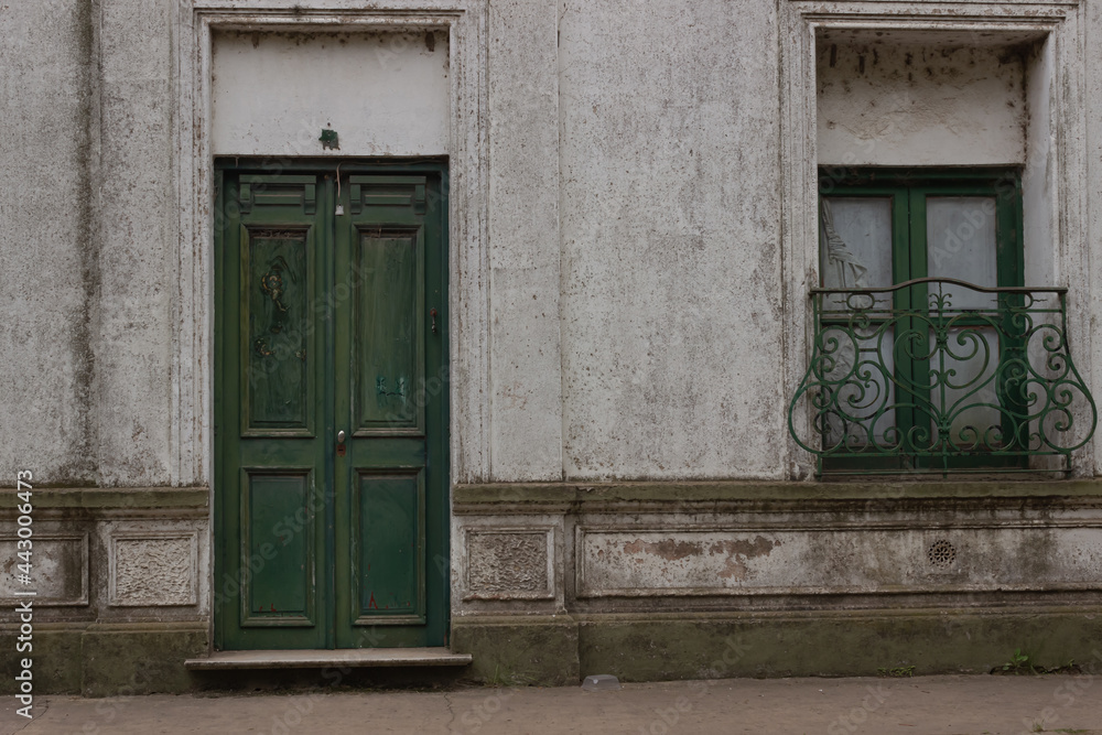 Old wooden green window and door. Old wooden green window and door.