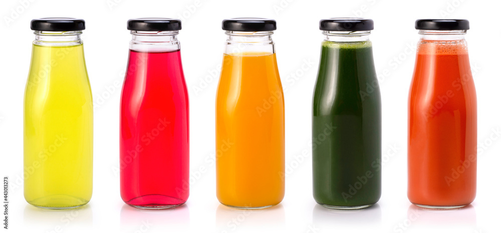 Set of fresh juice in glass bottle on white Set of fresh juice in glass bottle on white