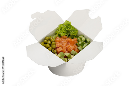 Salmon salad with vegetables in a paper box. Ready-made meal delivery, close-up, studio shot.