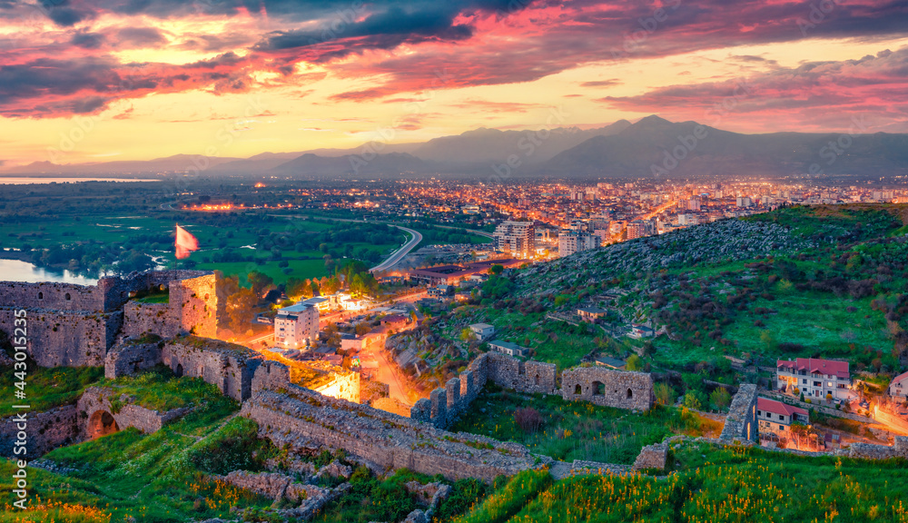 Exciting evening view of ruins of Rozafa Castle. Gorgeous sunset in Shkoder city. Stunning outdoor scene of Albania, Europe. Traveling concept background.