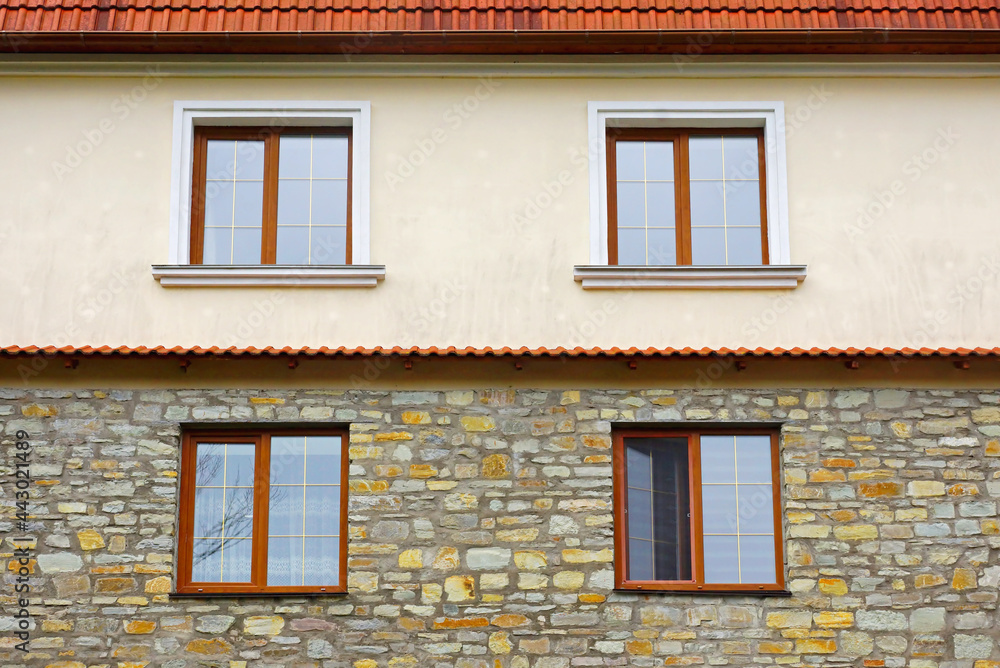 Fragment of wall with windows, separeted by material.