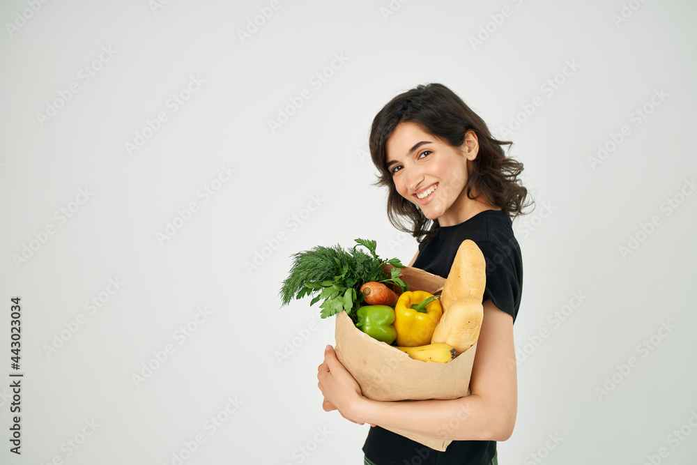 woman with a package of groceries health care delivery supermarket woman with a package of groceries health care delivery supermarket