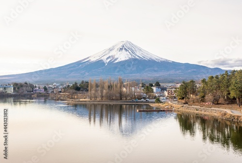 Landscape photo of Mount Fuji and its reflection on the water in the low key tone taken from Lake Kawaguchiko  Yamanashi Tokyo Japan