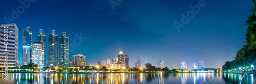 Bangkok, Thailand. Night cityscape view and reflection on the water with beautiful reflection of non light. Taken from Sukhumvit district, major of tourist, office and economic zone of Bangkok.