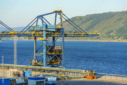 Extremely large port crane in blue.