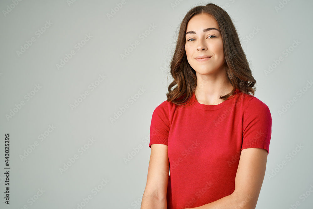 pretty brunette in red t-shirt fashion beautiful hair close-up pretty brunette in red t-shirt fashion beautiful hair close-up