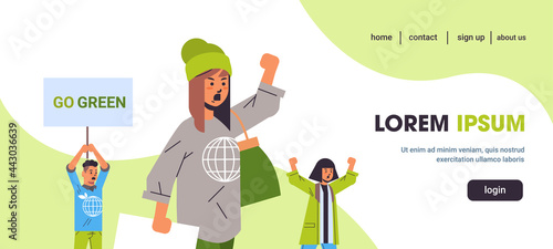 environmental activists holding poster go green save planet strike concept protesters campaigning to protect earth demonstrating against global warming portrait horizontal copy space
