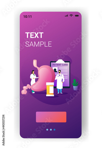 doctors examining human digestive tract system medical consultation internal organ inspection examination stomach treatment gastroenterology concept mobile app vertical copy space full length