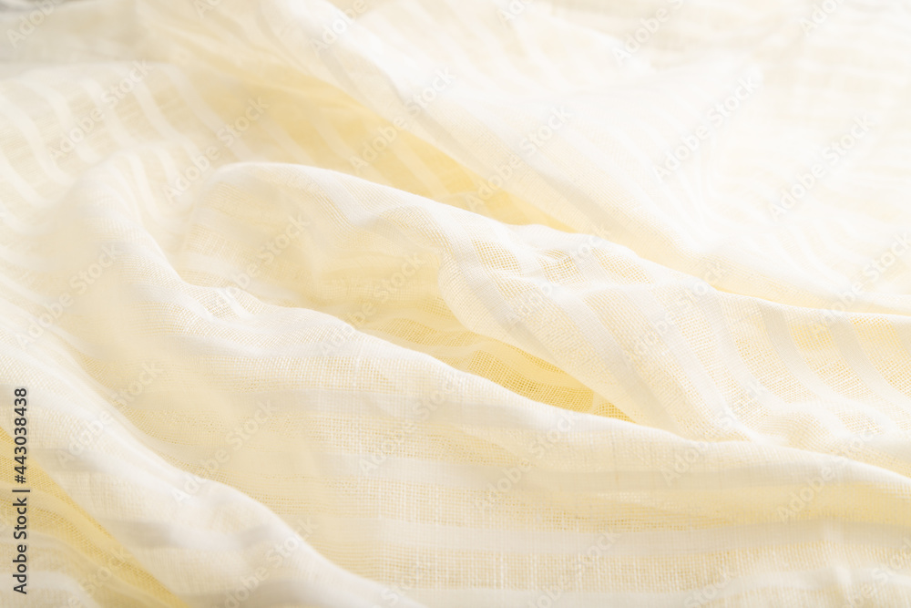 Fragment of white linen tissue. Side view, natural textile background. Fragment of white linen tissue. Side view, natural textile background.