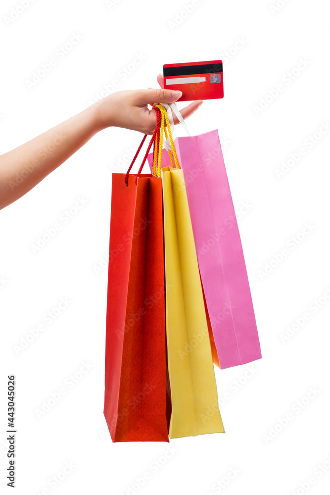 Shopping bags and credit card in hand.