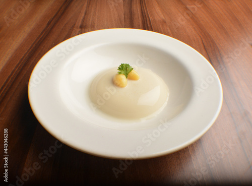 chilled round cute soya bean pudding jelly sweet dessert on wood table asian halal menu