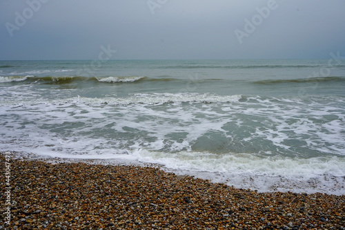 Ocean waves on a stone pebble beach