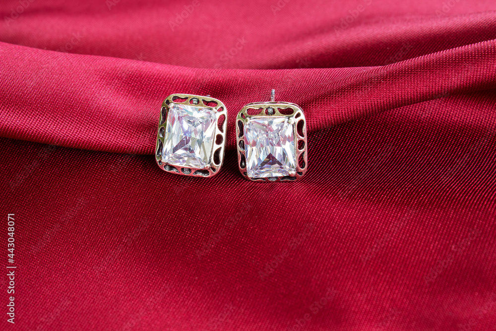 In the jewelry box there is a ring in a frame of pink delicate peon. In the jewelry box there is a ring in a frame of pink delicate peon.