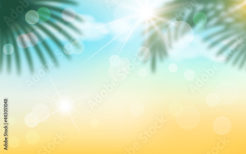 Abstract summer background with sunbeams and bokeh effect. Illustration of palm leaves, sand clouds and sky with bright sun.