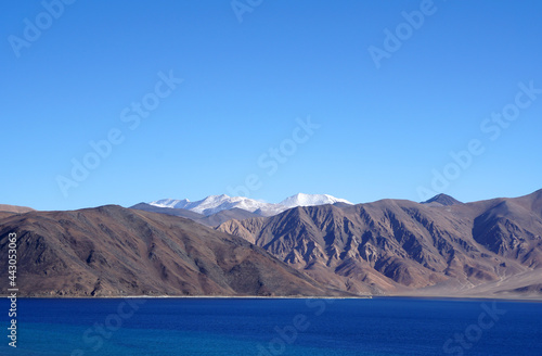 Landscape Nature Scene of Pangong tso or Pangong Lake with himalaya snow mountain background is best famous destination at Leh Ladakh ,Jammu and Kashmir , India 