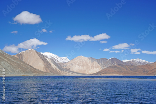 Landscape Nature Scene of Pangong tso or Pangong blue Lake with Himalaya Snow mountain background at Leh Ladakh ,Jammu and Kashmir , India - unseen travel vacation park and outdoor