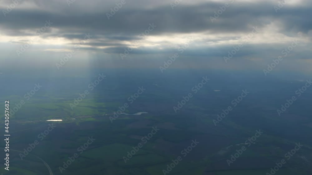 Sun rays above the earth, aerial view Sun rays above the earth, aerial view