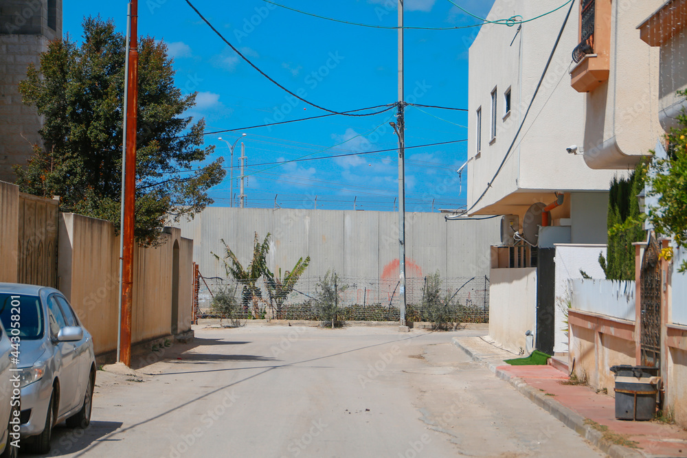 The Israeli wall. between Israel and West Bank, Qalqilya. west bank, Palestinian Territories, Palestine, July 2, 2021 The Israeli wall. between Israel and West Bank, Qalqilya. west bank, Palestinian Territories, Palestine, July 2, 2021
