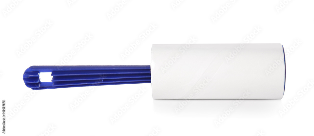 Lint roller on white background Lint roller on white background
