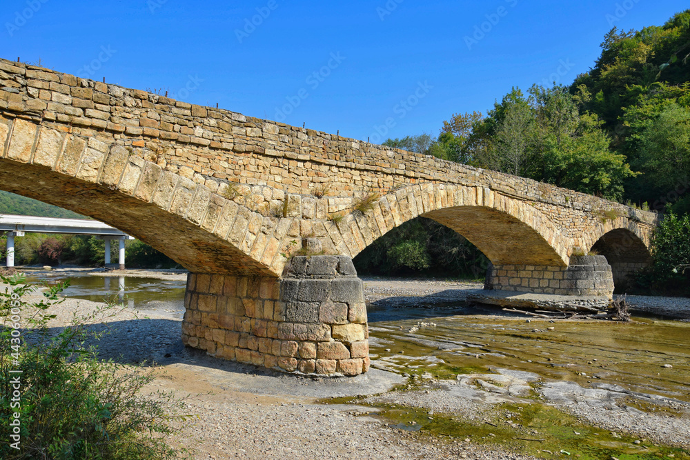Ancient stone bridge in Dakhovskaya village
