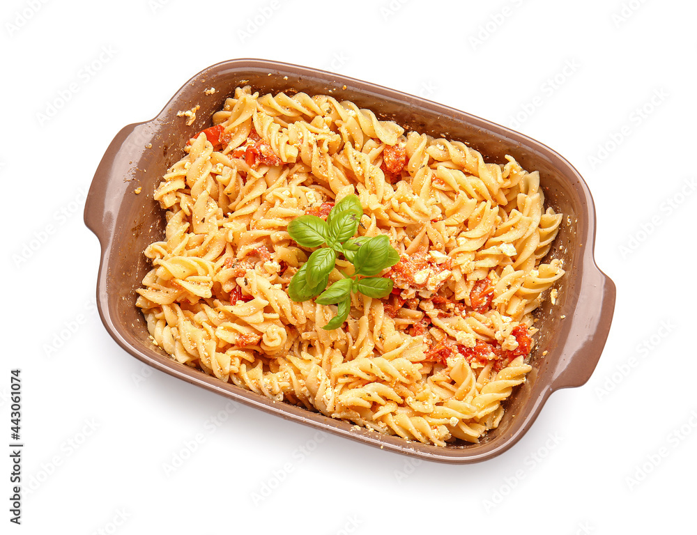 Baking dish with healthy pasta on white background
