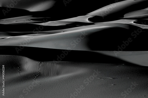 Fototapeta Naklejka Na Ścianę i Meble -  desert dunes, a journey to the Sahara, black and white